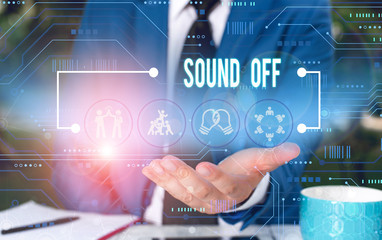 Text sign showing Sound Off. Business photo showcasing To not hear any kind of sensation produced by stimulation Male human wear formal work suit presenting presentation using smart device