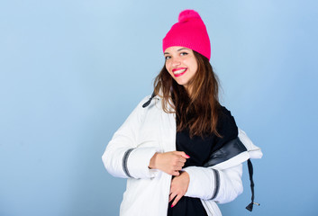 Cheerful and positive. beauty in winter clothing. cold season shopping. girl in padded warm coat. happy winter holidays. New year. girl in beanie hat. faux fur fashion. flu and cold. seasonal fashion