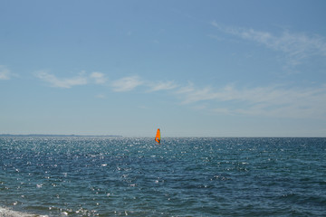 paradise coast windsurfing along the beach extreme sports and relaxation