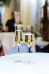 champagne glasses on round table