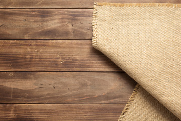 burlap hessian sacking on wooden background table