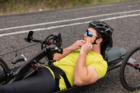 Man cycling on recumbent bicycle