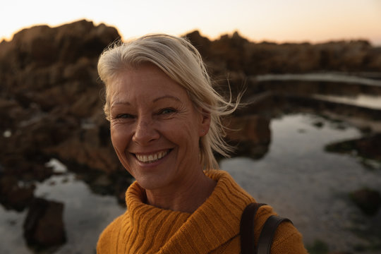 Woman enjoying time by the sea