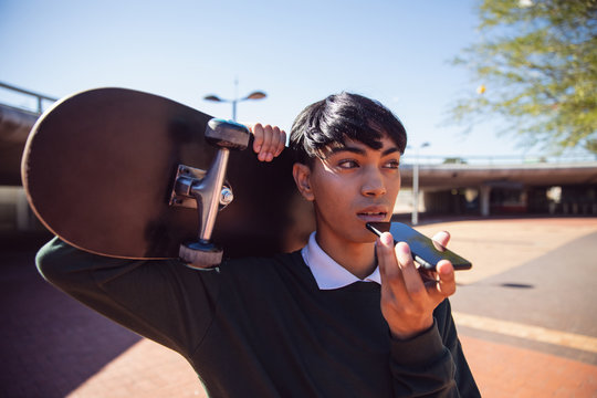 Young transgender adult in the street