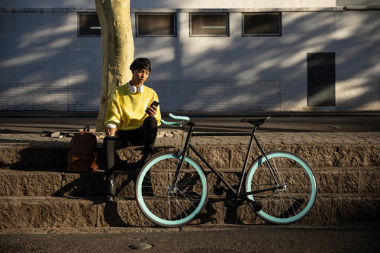 Young transgender adult in the street