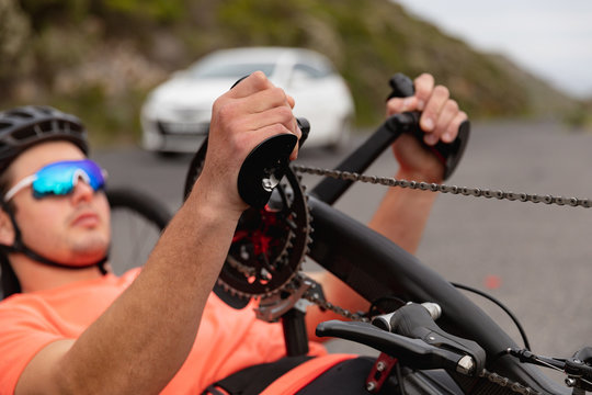 Man cycling on recumbent bicycle