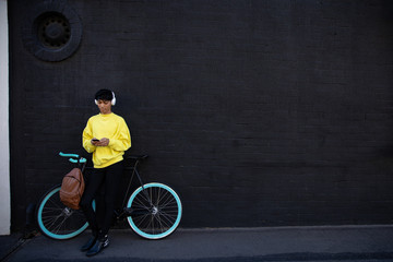 Young transgender adult in the street