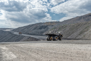 Quarry truck carries coal mined.