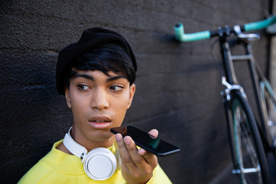 Young transgender adult in the street - Powered by Adobe