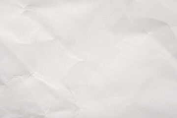 Abstract white crumpled paper texture background