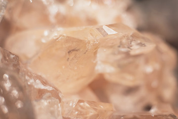 Close-up of pink translucent mineral and crystal stone.