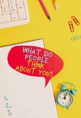 Conceptual hand writing showing What Do People Think About You Question. Concept meaning Opinion of others Considerations Empty red bubble paper on the table with pc keyboard