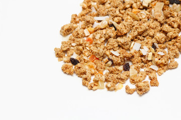Granola with fruits and nuts. Baked muesli mix. Super food concept. Breakfast cereals. Kids diet. White isolation background.