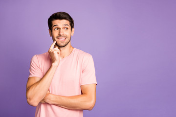 Portrait of his he nice attractive funny minded brunet bearded guy wearing pink tshirt creating new...