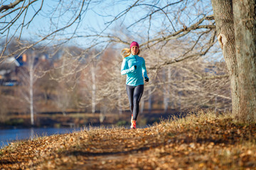 Fototapeta premium Fitness girl training running in the morning park