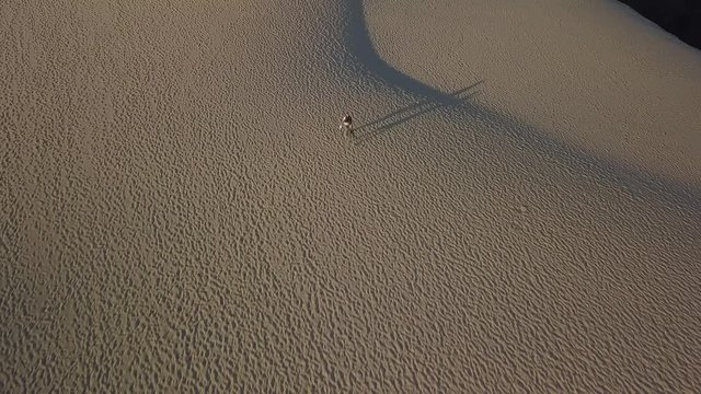 Run in desert. Two guys in Dune of Pyla.