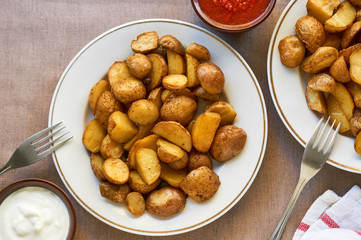 Baked potato wedges on a white plate