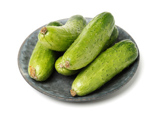 Green cucumber on the white background