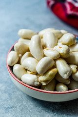 Organic Raw Unsalted White Peanuts in Bowl.