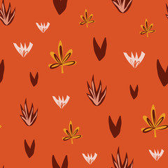 Abstract florals seamless vector doodle background red orange yellow. Flowers and leaves repeating pattern in fall colors. Use for surface pattern design, fabric, Thanksgiving, home decor, gift wrap