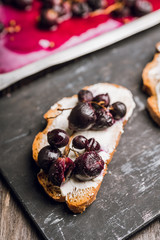 Sandwich with grilled grape and honey. Selective focus. Shallow depth of field.