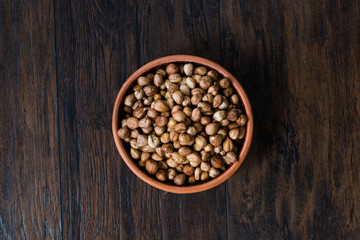 Roasted Macadamia Nuts in Stew Pot.