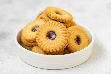 Pastry desert jam cookie with strawbey jam isolated , sweet snack