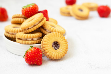 Pastry desert jam cookie with strawbey jam isolated , sweet snack