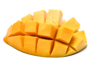 Mango slice cut to cubes close-up isolated on white background