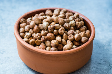 Roasted Macadamia Nuts in Stew Pot.
