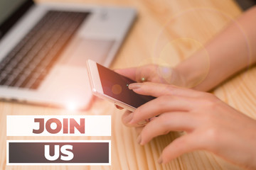 Handwriting text writing Join Us. Conceptual photo Register in community Team or blog Sign up at social media woman laptop computer smartphone mug office supplies technological devices
