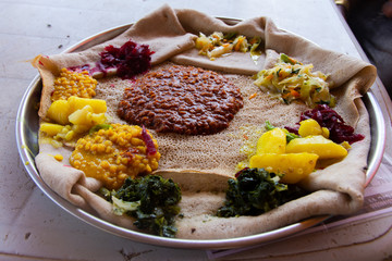 Injera firfir, typical Ethiopian food - 293563021