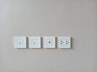 Row of electric outlet set in home, apartment, TV outlet , cable outlet and Electronic plug, close up with blank space grey background