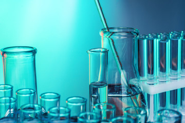 Laboratory chemistry glassware  on green toned background