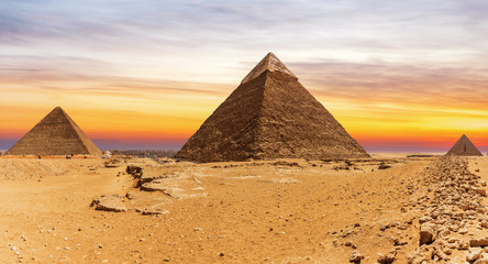 Fototapeta na wymiar The Great Pyramids and the sunset in Giza, Cairo, Egypt