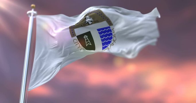 Flag of Tulsa city at sunset, United States of America - loop