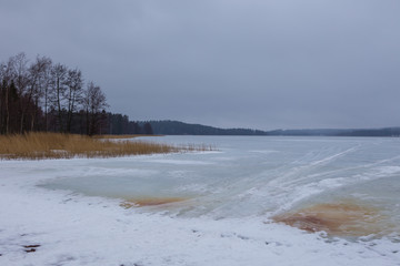 View of the frozen Iso Tilijarvi lake in Hollola, Finland.
