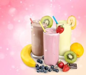 Fruit Smoothies with Straws  Isolated on a White Background
