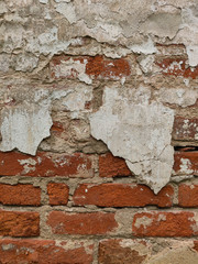 Old peeling plaster on the wall