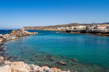 Entry the small port of Sissi with his taverns