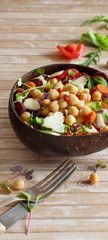 Chickpea salad with vegetables and microgreens