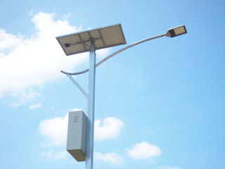 solar street light lamp post led with panel system and blue sky and white clouds using for...