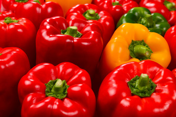 Fresh red, green, yellow bell pepper background.