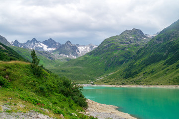 Fototapeta na wymiar View of mountains and lake Vermunt along Silvretta High Alpine Road, Austria