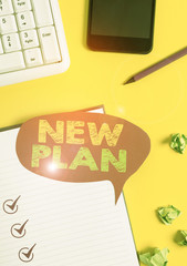 Handwriting text New Plan. Conceptual photo Start of a detailed proposal of doing or achieving...