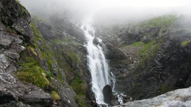 Beautiful waterfall in Norway mountains Trollstigen 4K