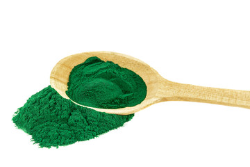 Spirulina powder blue-green algae in wooden spoon on white