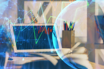 Double exposure of forex chart and work space with computer. Concept of international online trading.