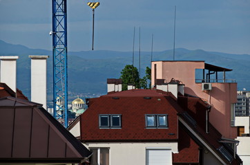 Residential neighborhood with new modern houses against the backdrop of a cityscape in the Bulgarian capital Sofia, Bulgaria  