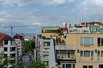 Residential neighborhood with new modern houses against the backdrop of a cityscape in the Bulgarian capital Sofia, Bulgaria  